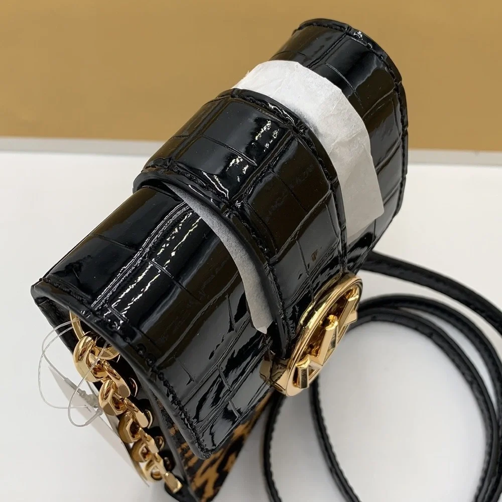 Brand New with Tag
Michael Kors Carmen Small NS Phone XBODY HairCalf
Black Multi - Picture 8 of 16